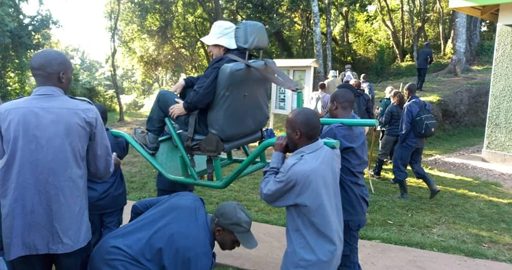 Gorilla-Trekking-for-Disabled.-A-traveller-being-carried-on-a-sedan-chair-to-go-gorilla-trekking-in-Bwindi
